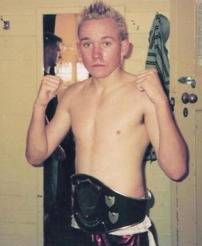Powrbox founder Bryce at 16 with his amateur boxing title belt